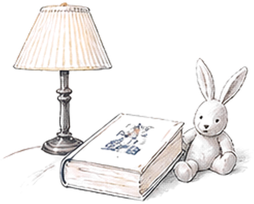 A bedside lamp, a book and a toy rabbit
