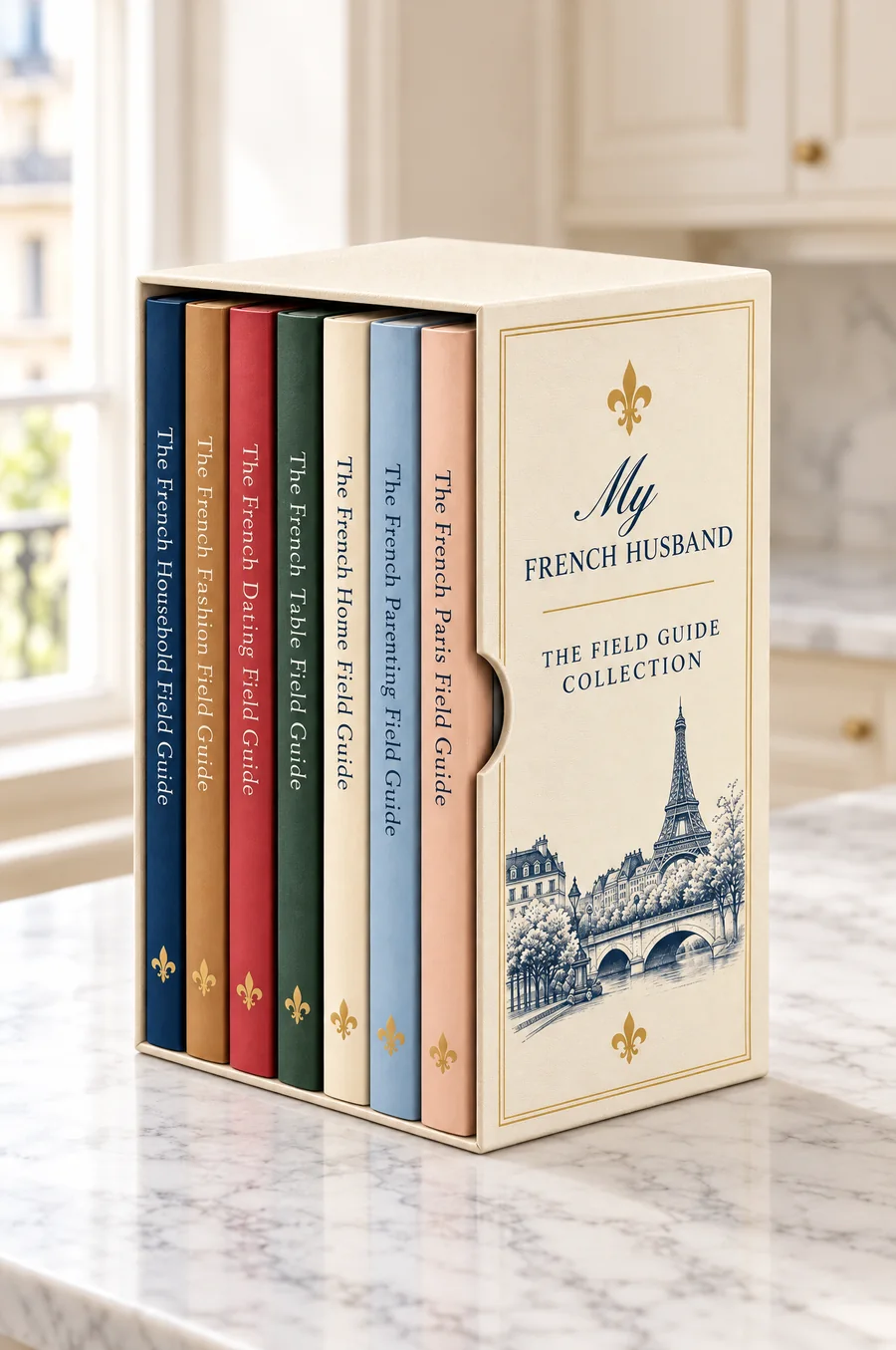 The Field Guide Collection box on a marble kitchen counter: seven French Field Guides, from Household to Paris